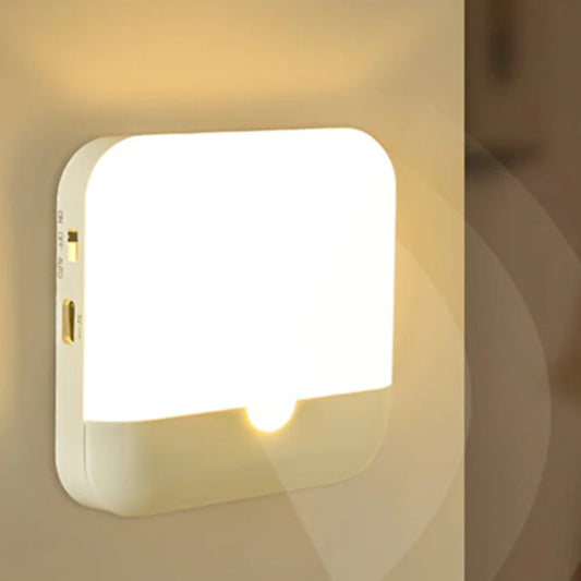 Add a modern glow to your space with our Minimalist Square Wall Light. Perfect for dorm rooms, hallways, or bedside lighting, this sleek LED fixture brings warmth and style without taking up space. Its soft glow creates the ideal atmosphere for winding down or navigating at night.

✨ Key Features:
- Sleek & Minimal Design: Blends effortlessly with any room decor.
- Soft LED Light: Gentle on the eyes — perfect for nighttime use.
- Easy Installation: Mounts easily with adhesive or screws.
- Energy Efficient: 