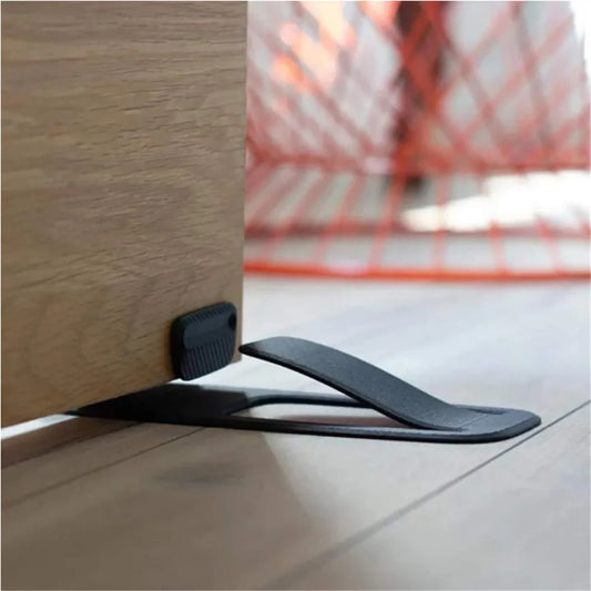 Keep your door firmly in place with this no-slip adjustable door stopper. Designed for durability and easy use, it slides under doors to prevent unwanted movement. Perfect for homes, offices, and classrooms with tile or hardwood floors.
