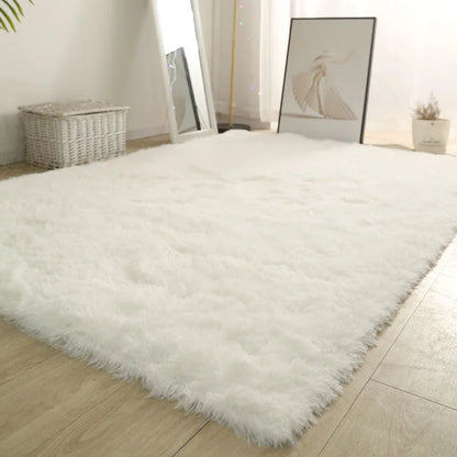 Step into comfort with our White Fluffy Soft Area Rug – the ultimate upgrade for your space. Whether you’re decorating your dorm, bedroom, or cozy corner, this plush rug adds a warm and stylish touch that feels as good as it looks.

✨ Key Features:
- Ultra-Soft Texture: Sink your feet into cloud-like comfort every day.
- Modern Minimal Design: Clean white finish complements any decor style.
- Non-Slip Bottom: Stays in place and adds safety on hardwood or tile floors.
- Easy to Clean: Just shake it out or ge